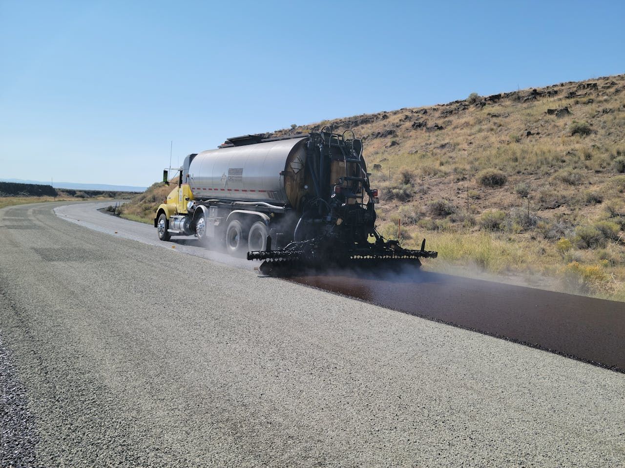 Asphalt paving crew working in Flowood, Mississippi